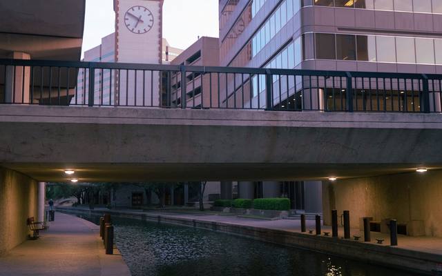 Quiet stretch of the San Antonio River beneath a downtown overpass