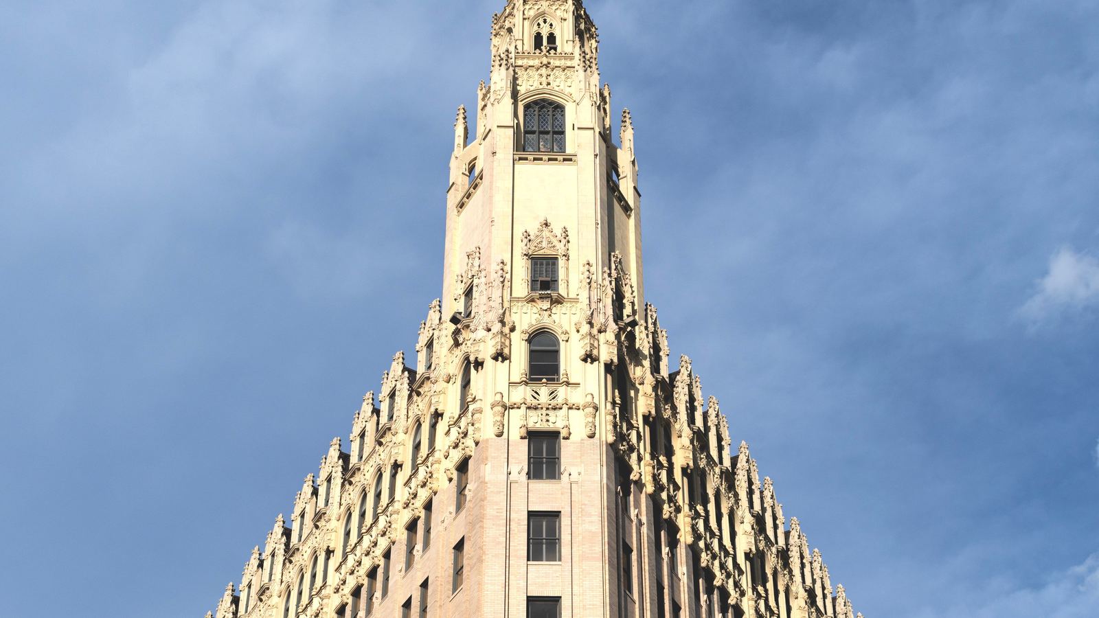Gothic revival tower flying the Texas flag in downtown San Antonio