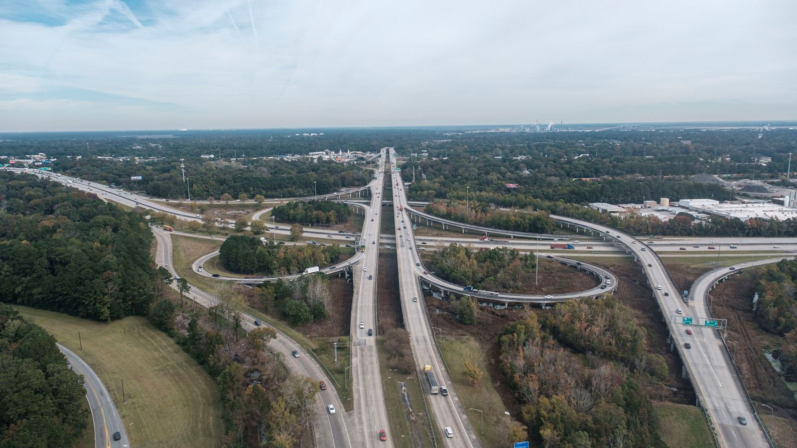 Aerial view of a highway interchange and its curving ramps