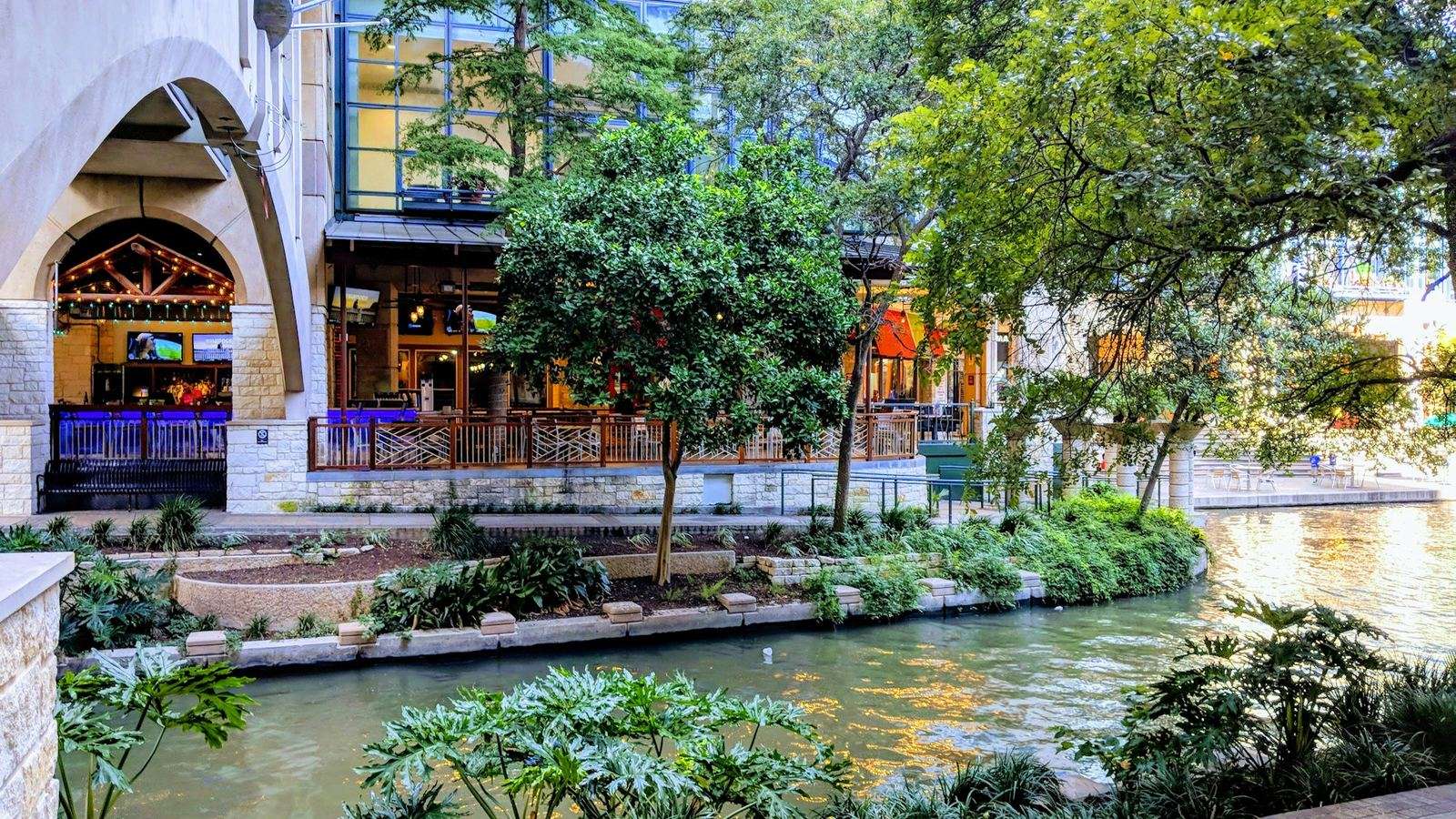 Daytime terraces and greenery along the San Antonio River Walk